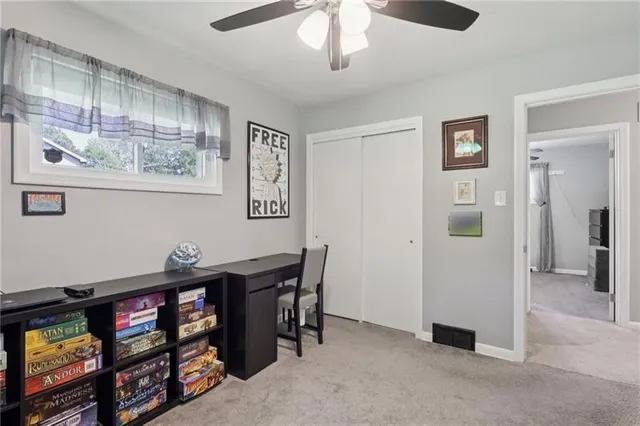 a view of a livingroom with furniture and a chandelier