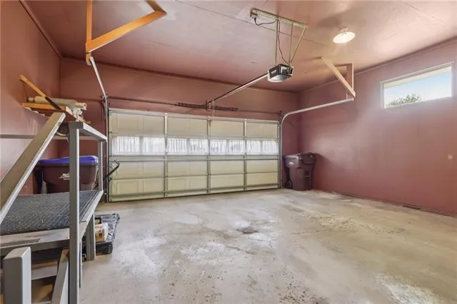 a view of a room with lots of gym equipment