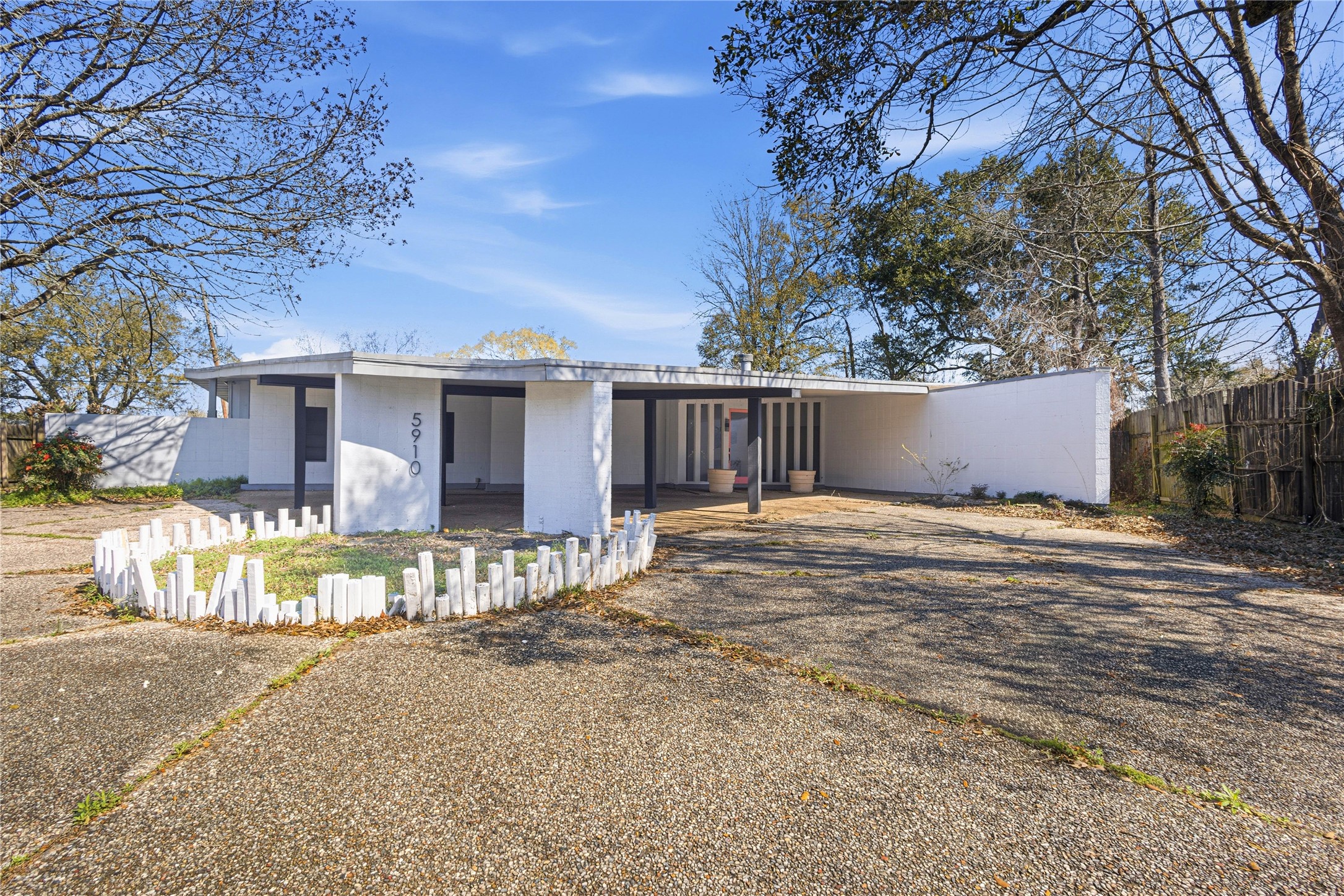 5910 Zenith Street Beaumont, TX 77706 - Photo 14 of 36 a view of a house with a yard and large tree