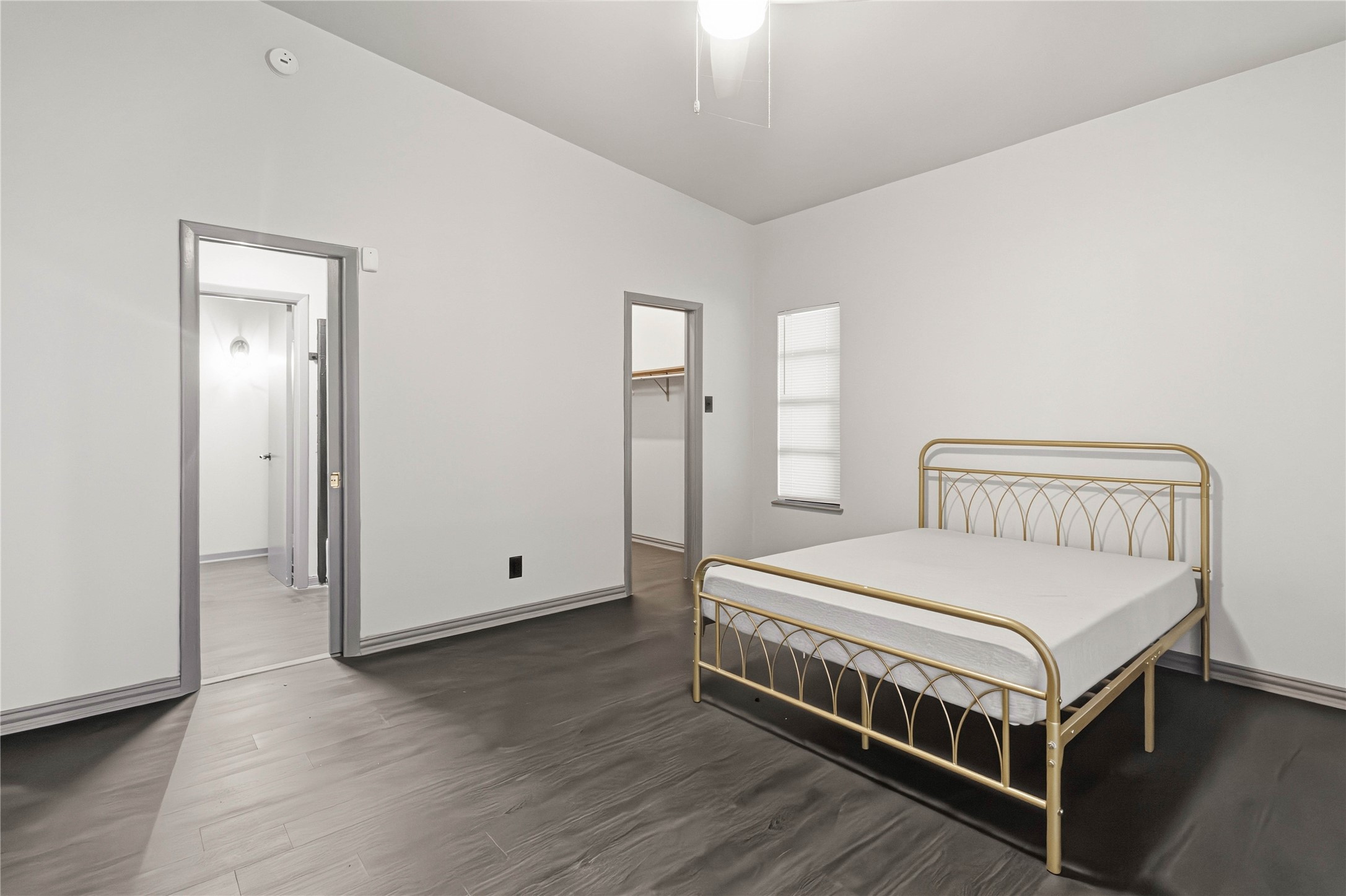 5910 Zenith Street Beaumont, TX 77706 - Photo 18 of 36 a bedroom with a bed and a night stand