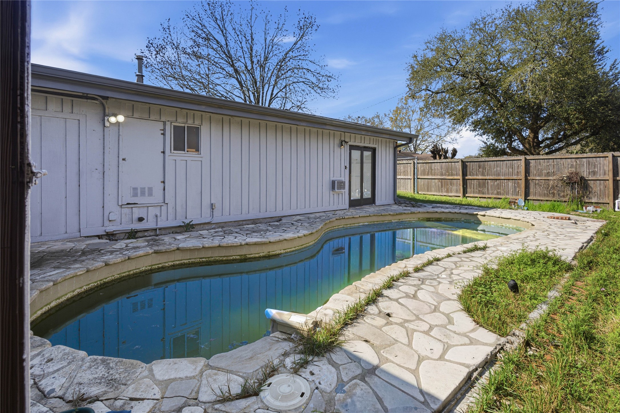 5910 Zenith Street Beaumont, TX 77706 - Photo 34 of 36 a view of backyard with swimming pool and outdoor seating