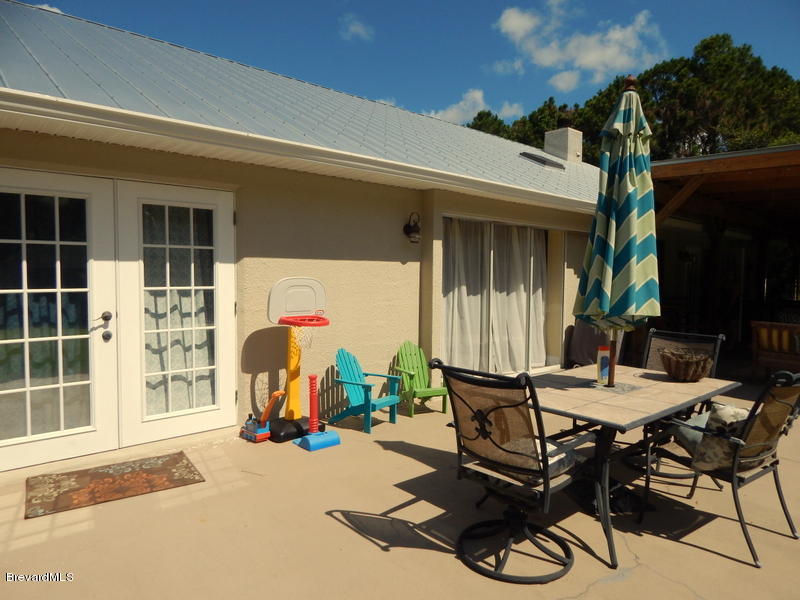 4381 Country Road Melbourne, FL 32934 - Photo 40 of 44 Uncovered patio
