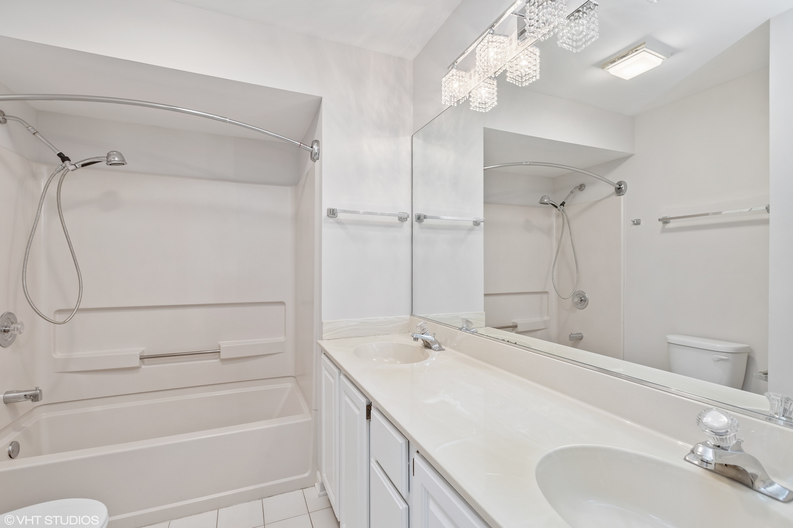 256 Haber Court, Unit 256 Cary, IL 60013 - Photo 8 of 12 a bathroom with a sink a toilet and shower