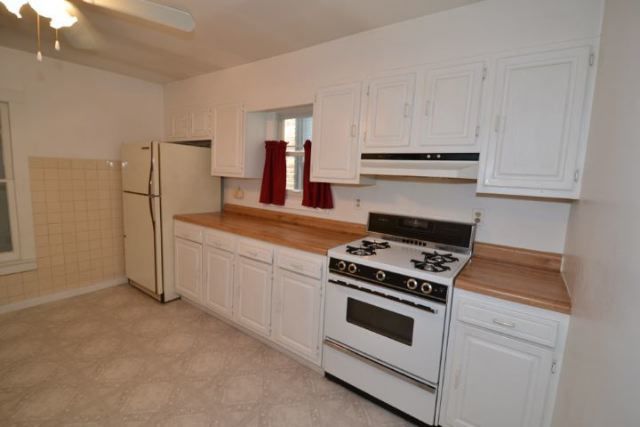 3239 North Leavitt Street, Unit 2 Chicago, IL 60618 - Photo 3 of 12 a kitchen with cabinets and appliances