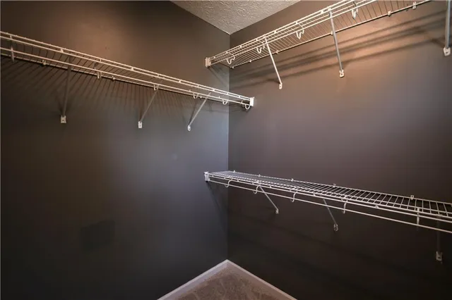 a view of a room with racks on the wall