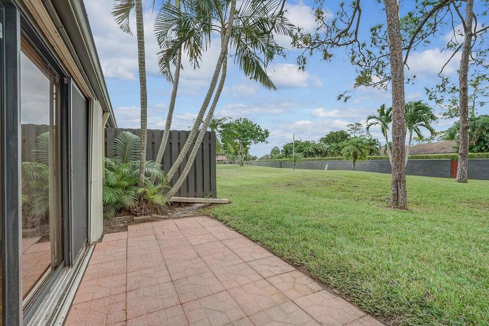 540 Shady Pine Way, Unit B Greenacres, FL 33415 - Photo 23 of 30 Exterior Open Patio