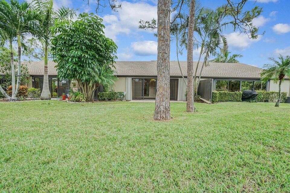 540 Shady Pine Way, Unit B Greenacres, FL 33415 - Photo 24 of 30 Exterior Backyard