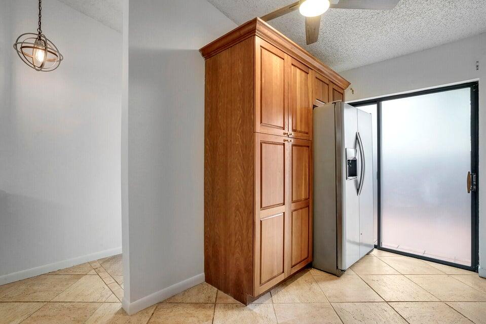 540 Shady Pine Way, Unit B Greenacres, FL 33415 - Photo 8 of 30 Kitchen Pantry