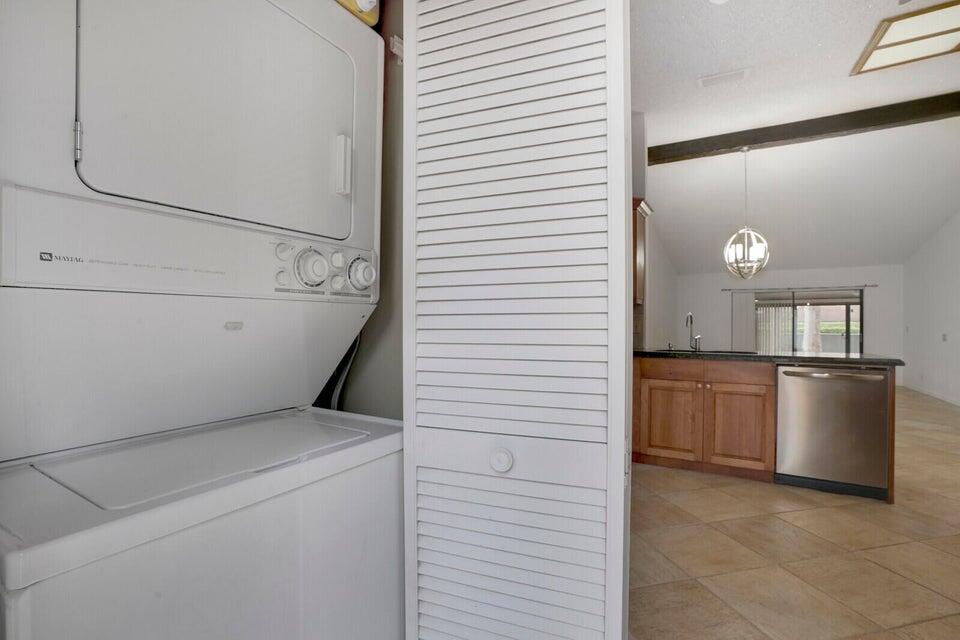 540 Shady Pine Way, Unit B Greenacres, FL 33415 - Photo 9 of 30 Washer Dryer in Kitchen