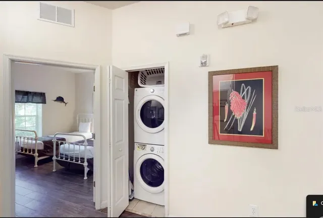 a view of living room with washer and dryer