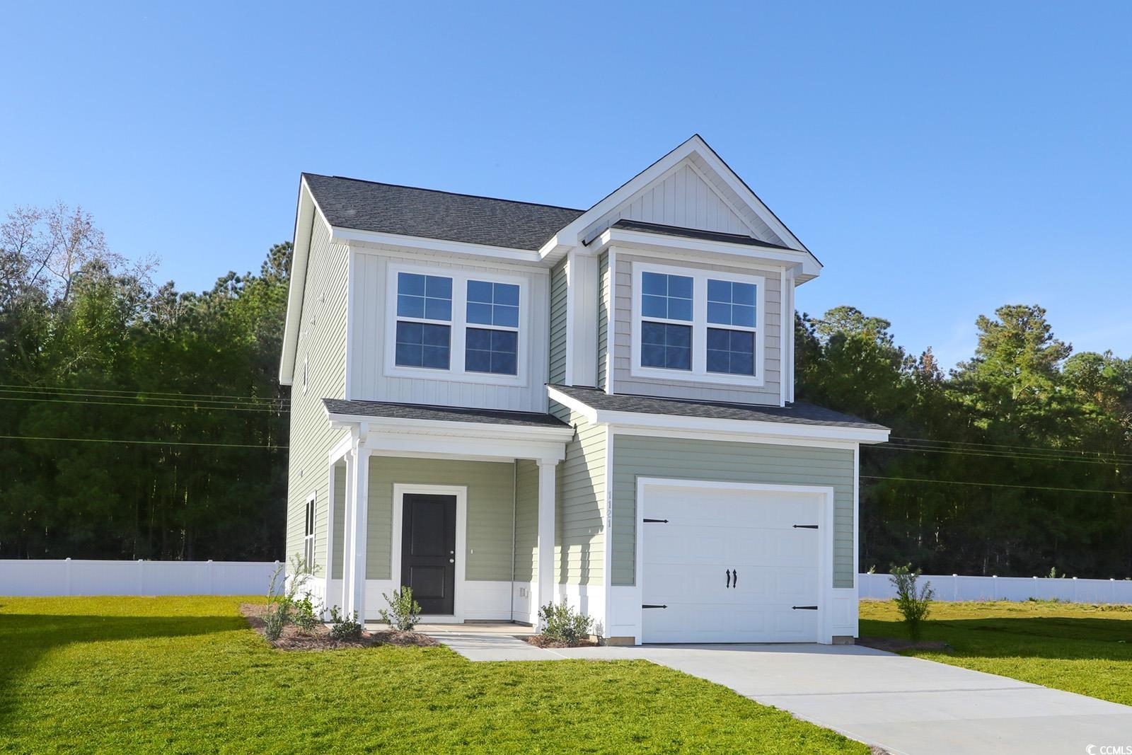 1121 Hainer Place Drive Conway, SC 29526 - Photo 2 of 28 View of front of property featuring a porch, a garage, board and batten siding, a shingled roof, and driveway