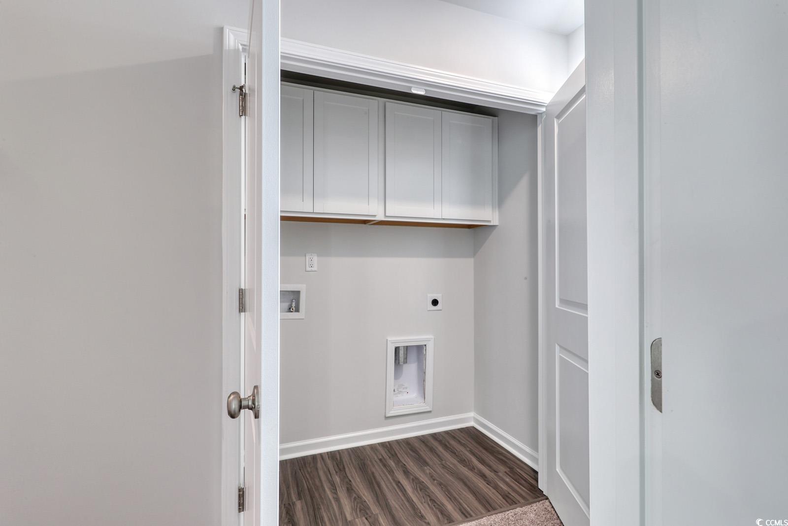 1121 Hainer Place Drive Conway, SC 29526 - Photo 23 of 28 Laundry area featuring hookup for a washing machine, electric dryer hookup, cabinet space, and dark wood-style flooring