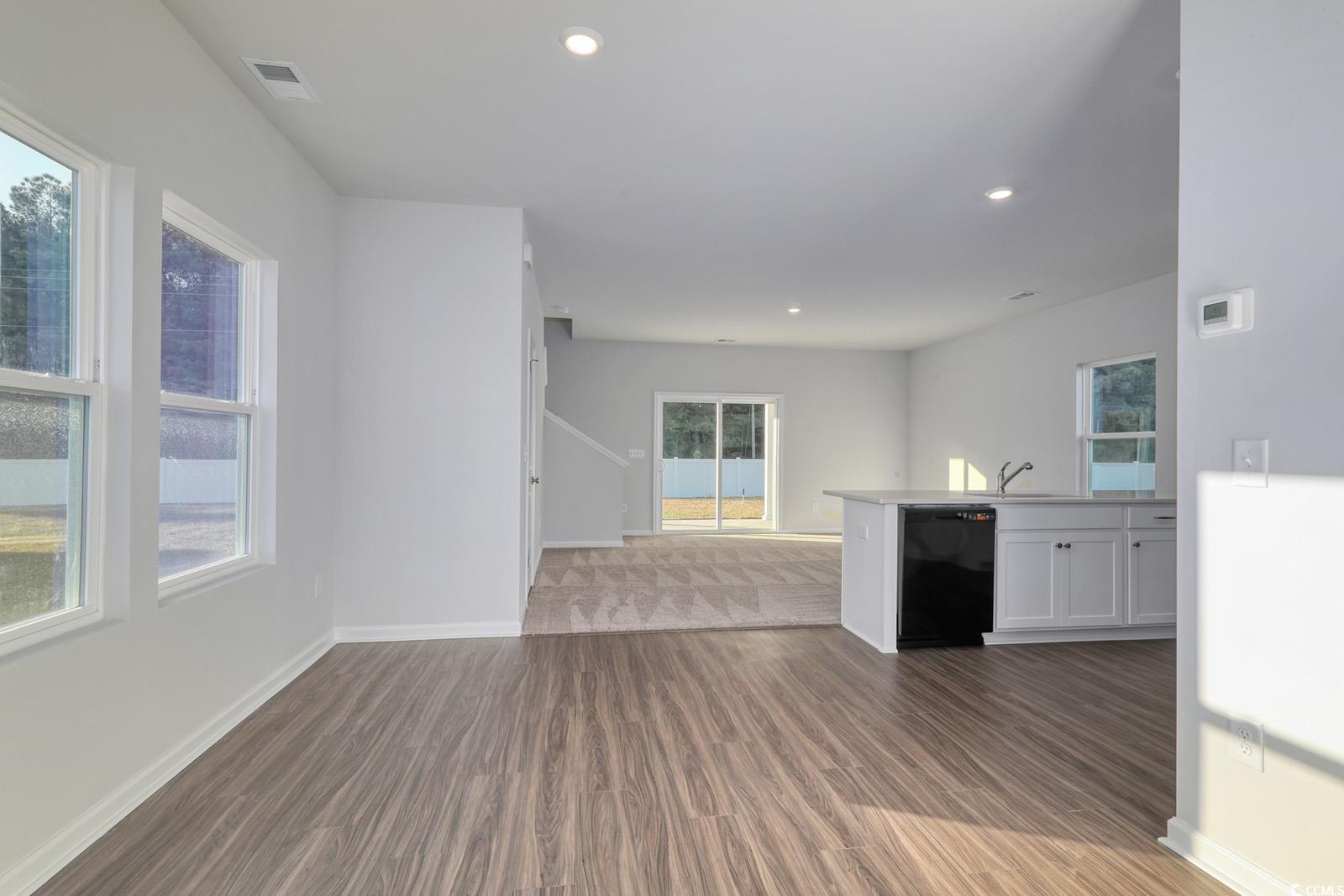 1121 Hainer Place Drive Conway, SC 29526 - Photo 9 of 28 Unfurnished living room with recessed lighting and dark wood finished floors