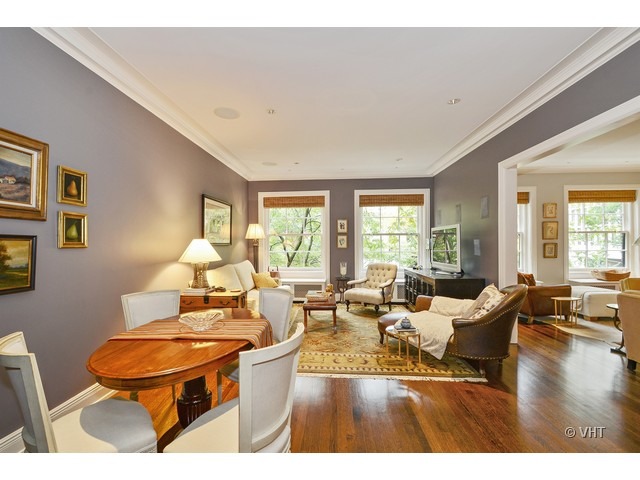 24 East Scott Street, Unit 3 Chicago, IL 60610 - Photo 6 of 10 a living room with furniture dining table and a large window
