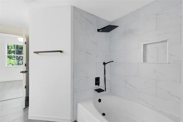 a bathroom with a bathtub