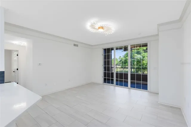 a view of a room with a large window