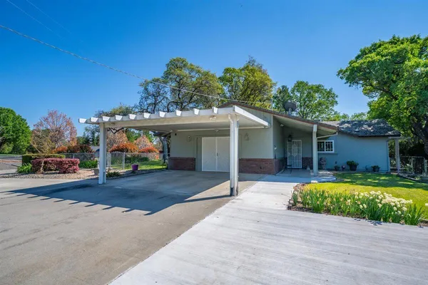 front view of a house with a patio