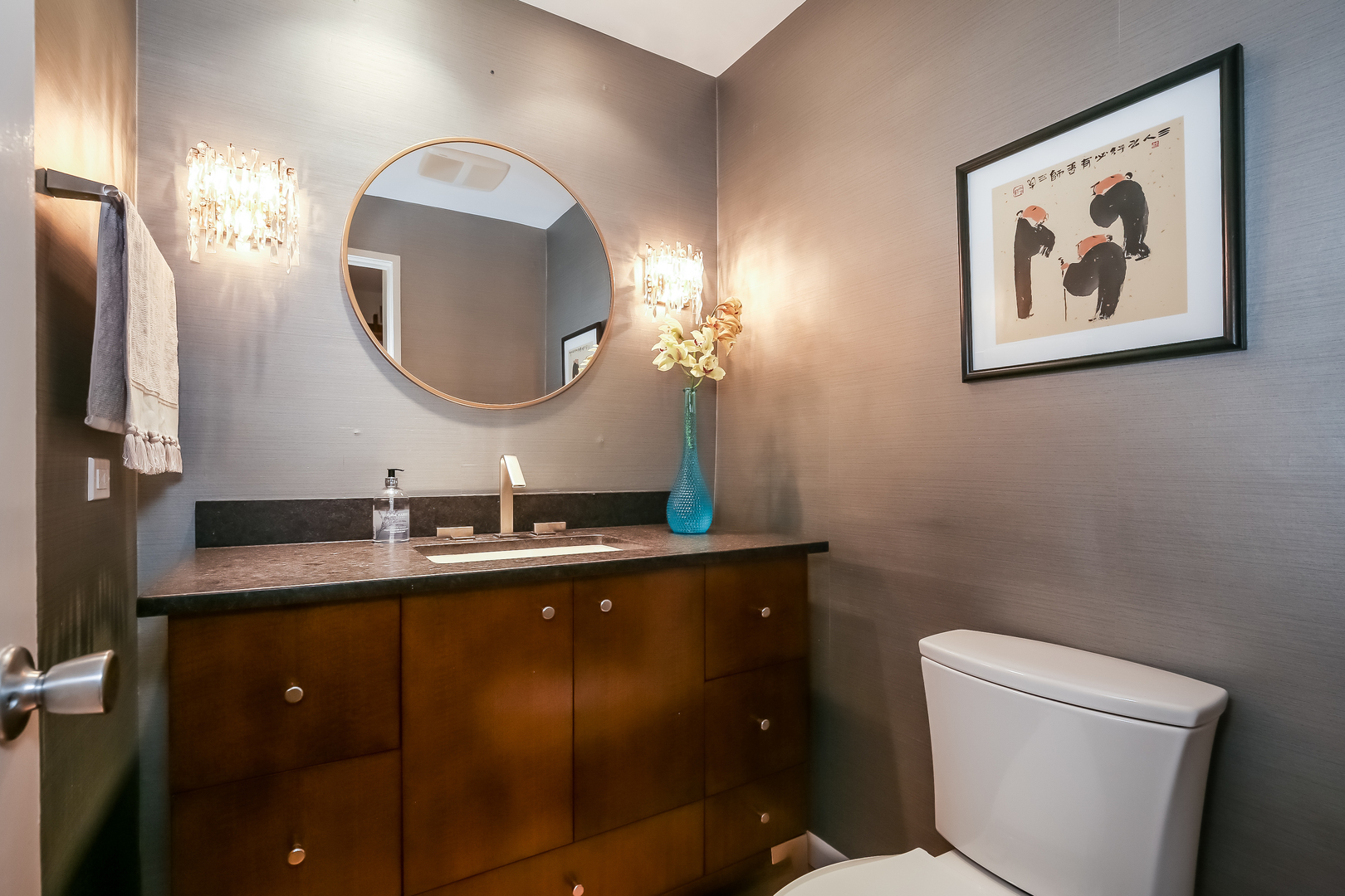 506 Forest Cove Road Lake Bluff, IL 60044 - Photo 23 of 53 a bathroom with a toilet a sink and mirror