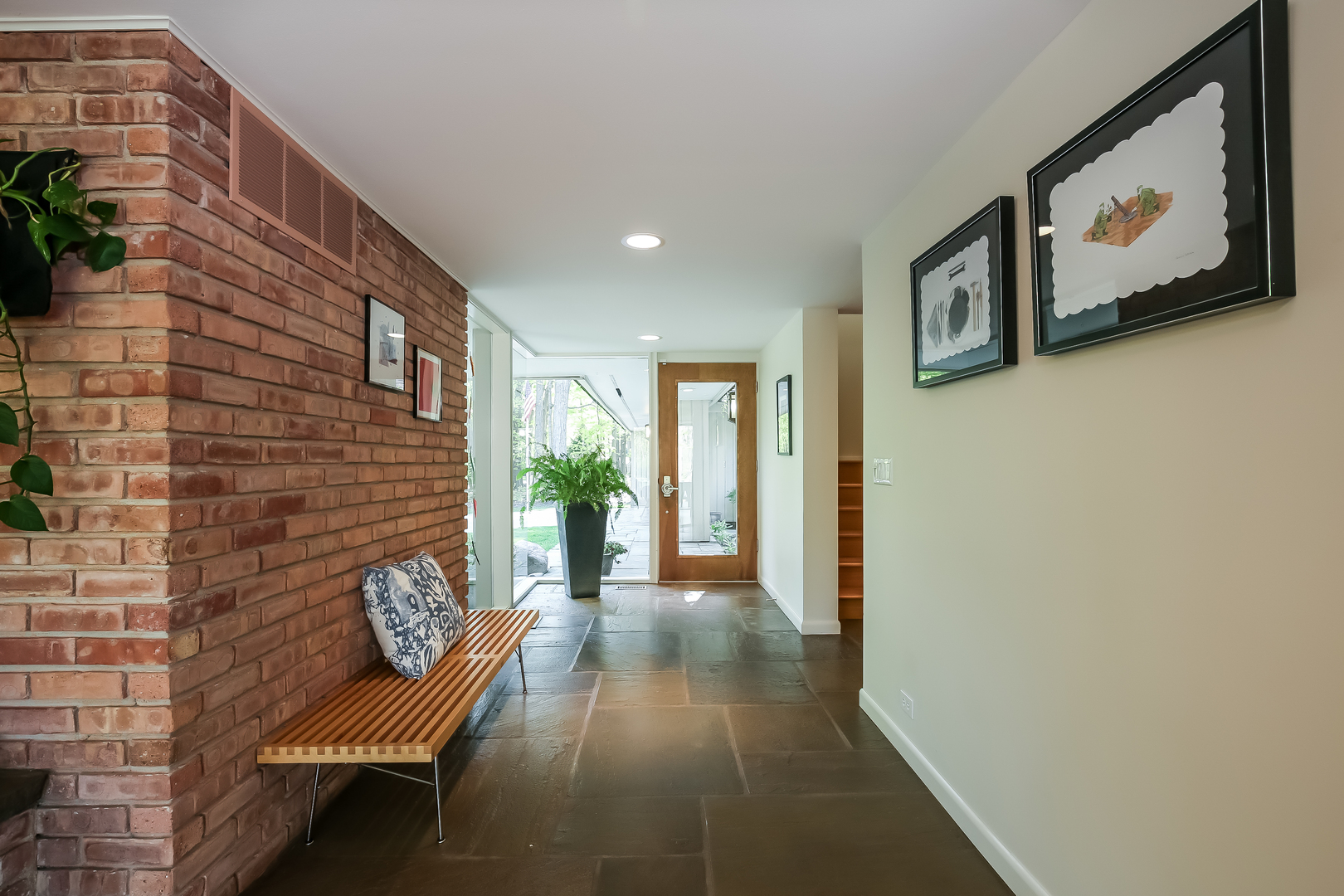 506 Forest Cove Road Lake Bluff, IL 60044 - Photo 9 of 53 a view of a hallway with wooden floor