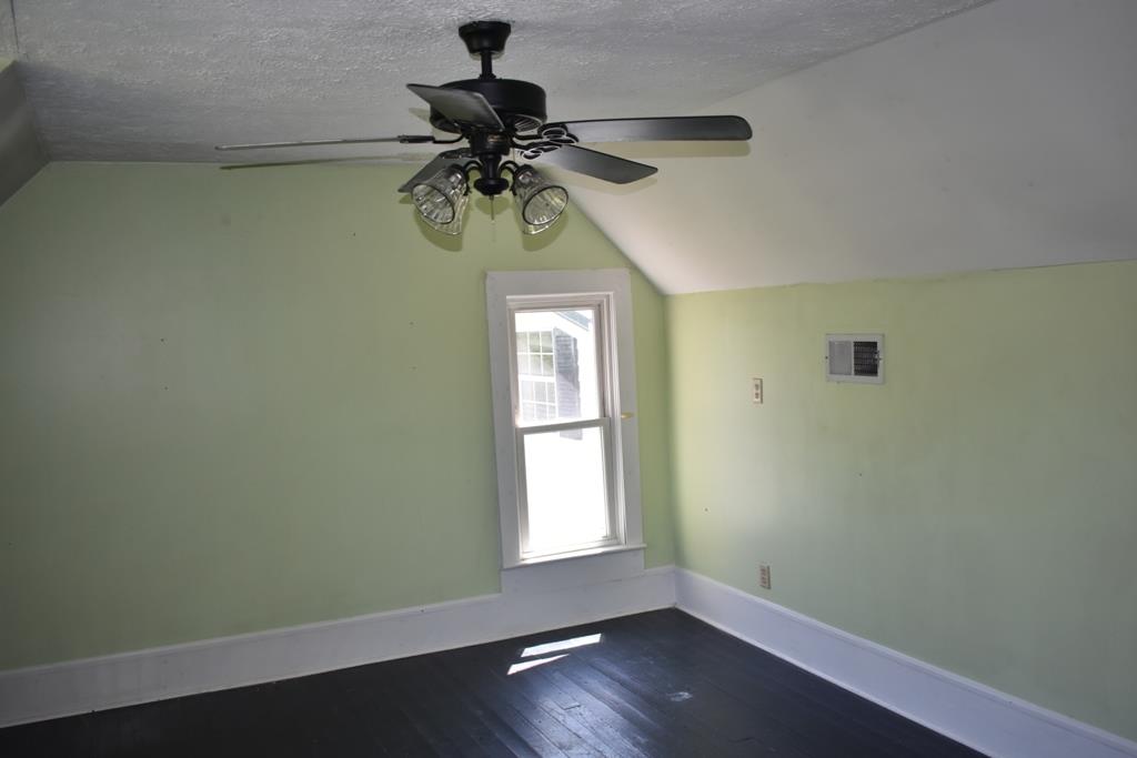 14436 Indian Springs Road Buffalo Valley, TN 38548 - Photo 6 of 24 a view of a room with a window and wooden floor