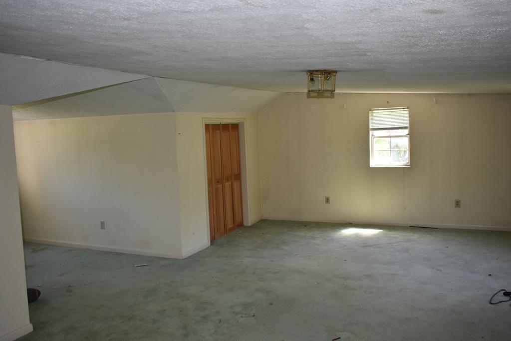 14436 Indian Springs Road Buffalo Valley, TN 38548 - Photo 7 of 24 an empty room with windows
