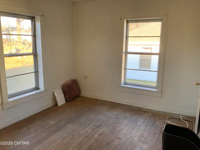 a view of a room with a window