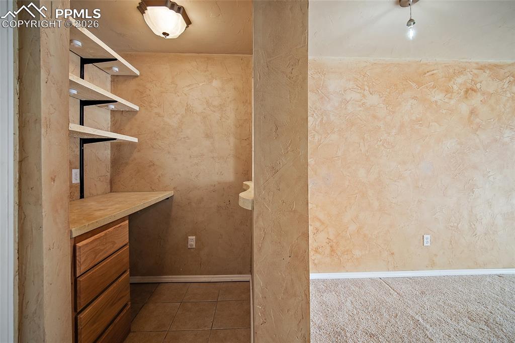 7215 Amber Ridge Drive Colorado Springs, CO 80922 - Photo 29 of 48 bar in basement