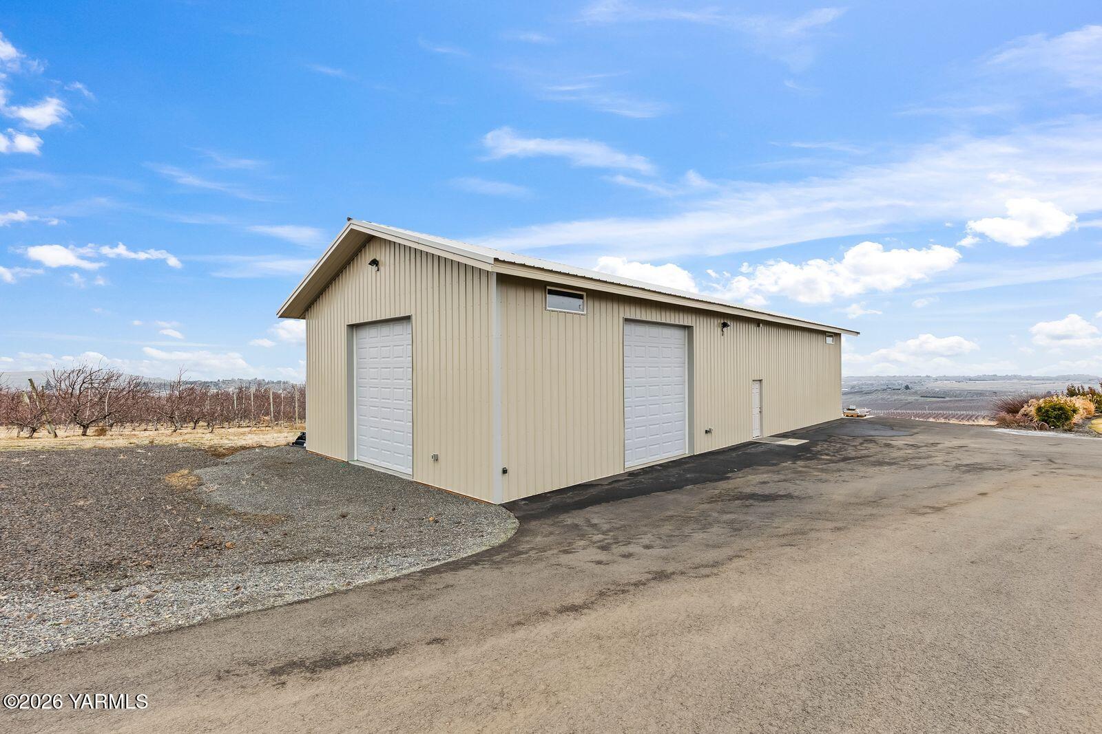 13990 Marble Road Yakima, WA 98908 - Photo 57 of 60 a view of a house with backyard