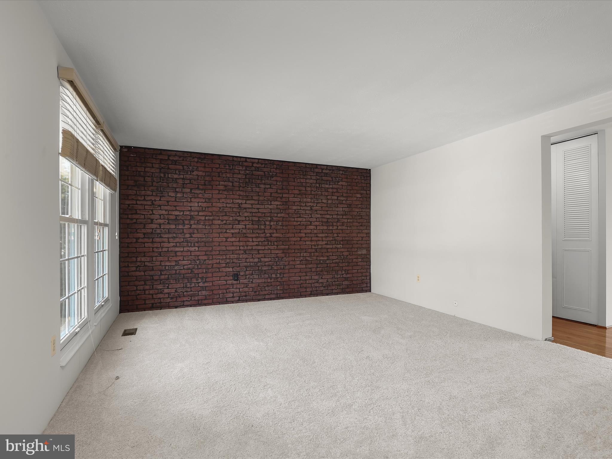 7971 Quail Court Glen Burnie, MD 21061 - Photo 12 of 52 a view of an empty room with a window