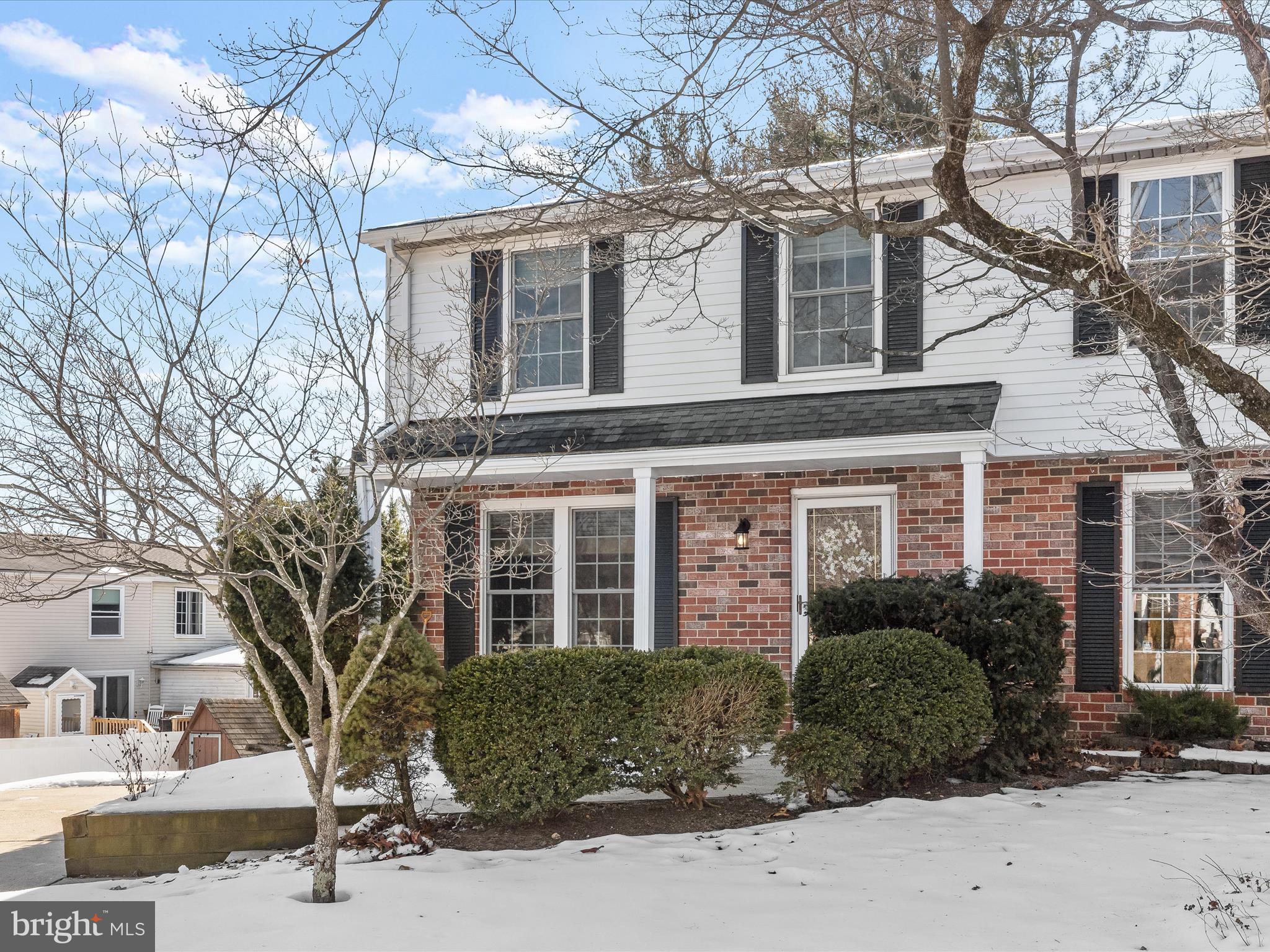 7971 Quail Court Glen Burnie, MD 21061 - Photo 2 of 52 a front view of a house with a yard