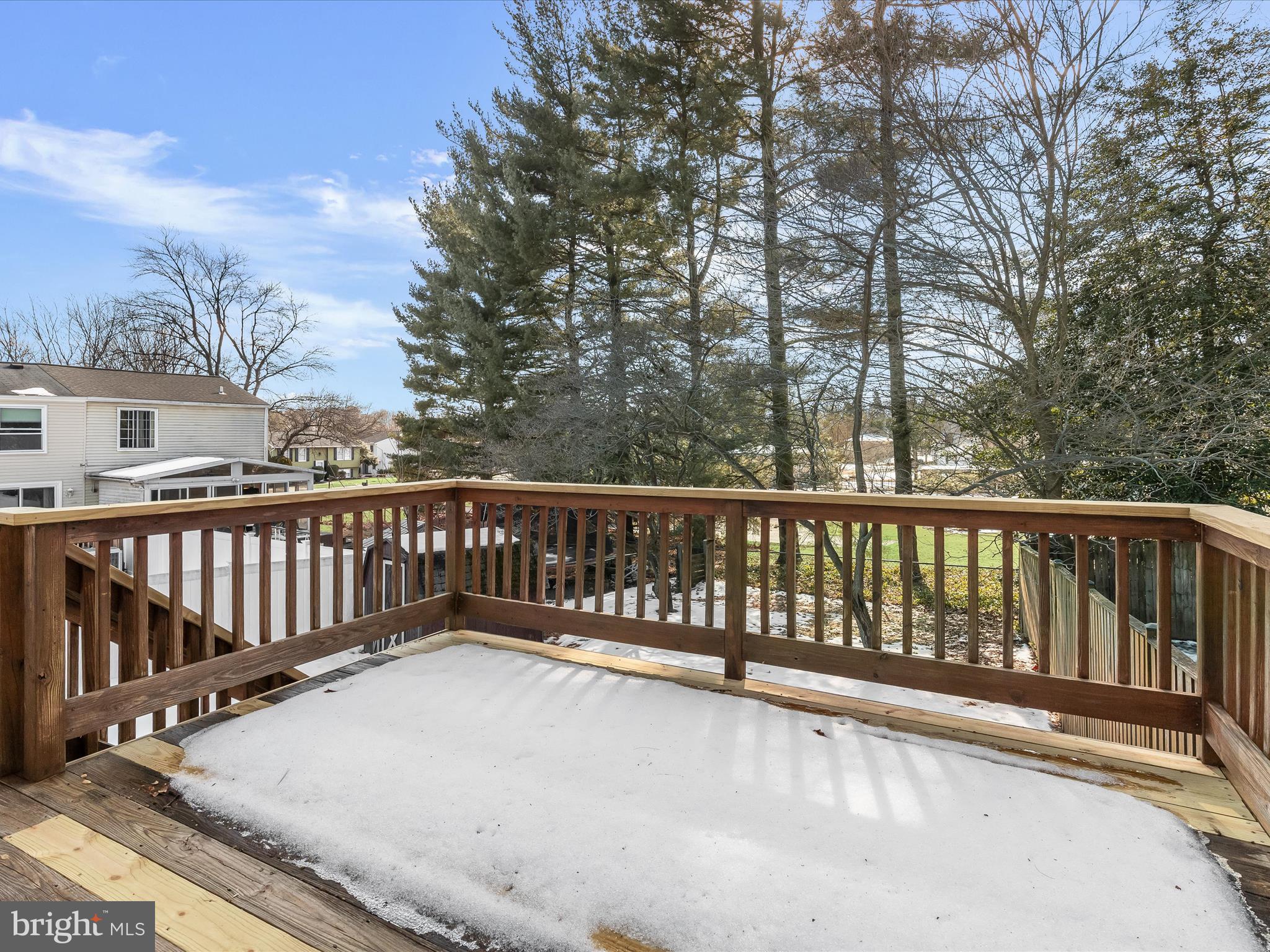 7971 Quail Court Glen Burnie, MD 21061 - Photo 21 of 52 a balcony with wooden floor and fence