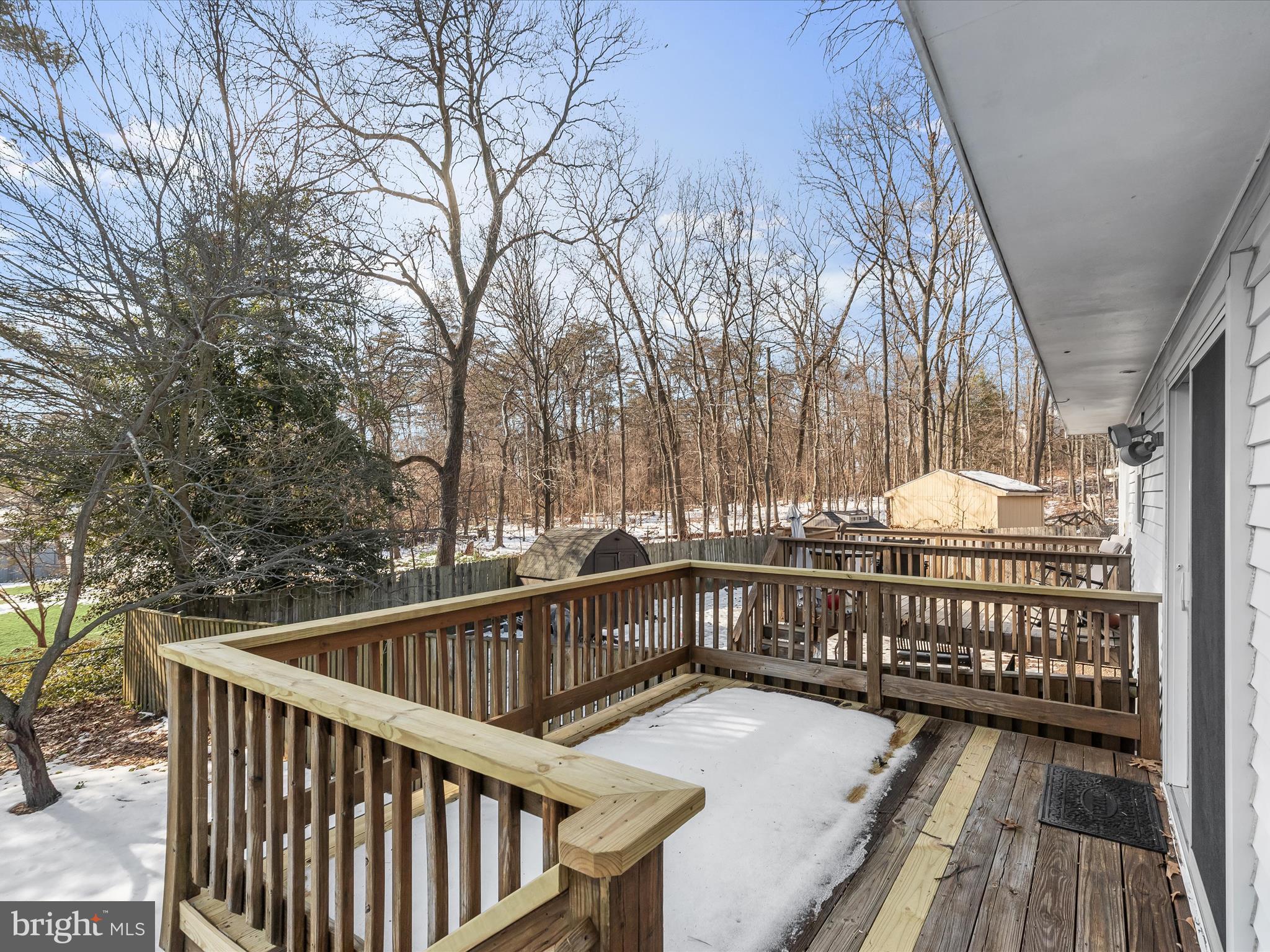 7971 Quail Court Glen Burnie, MD 21061 - Photo 22 of 52 a view of balcony with wooden floor and fence