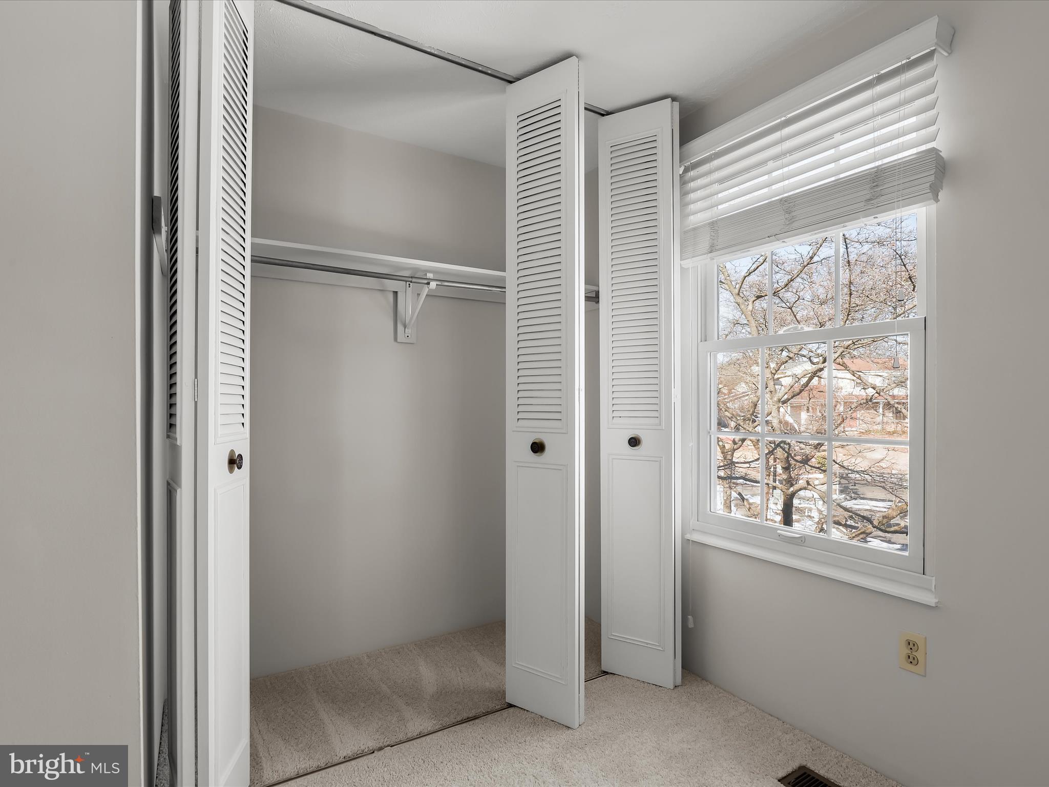 7971 Quail Court Glen Burnie, MD 21061 - Photo 28 of 52 a bathroom with a glass shower door