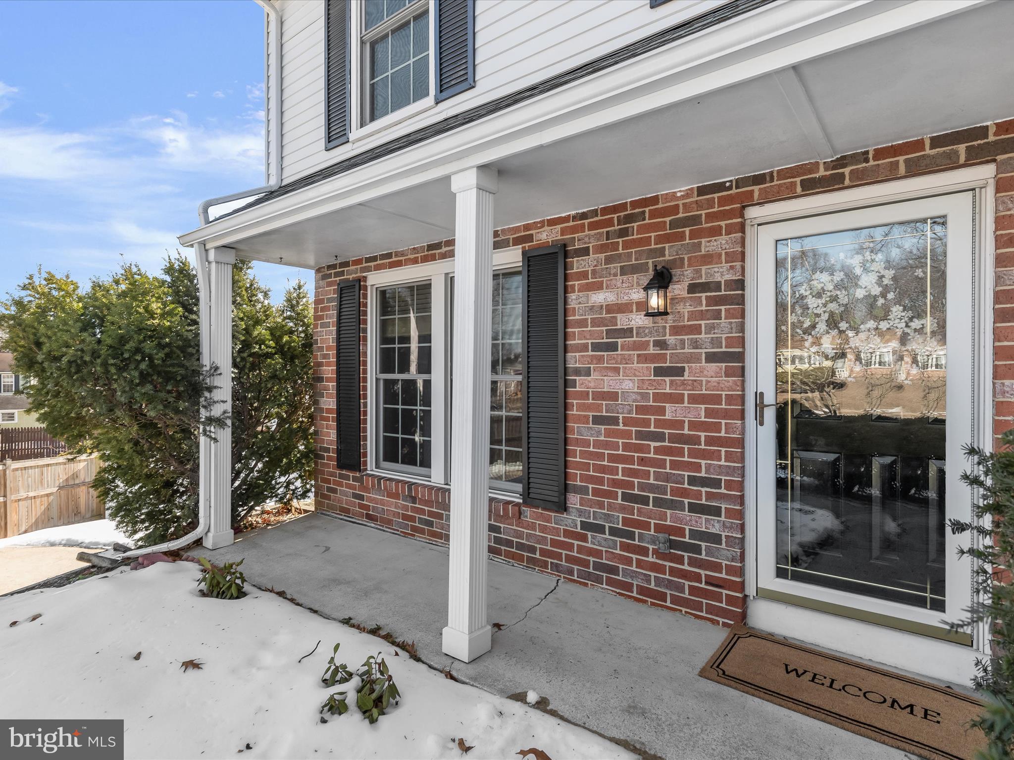 7971 Quail Court Glen Burnie, MD 21061 - Photo 3 of 52 a view of a entryway door of the house