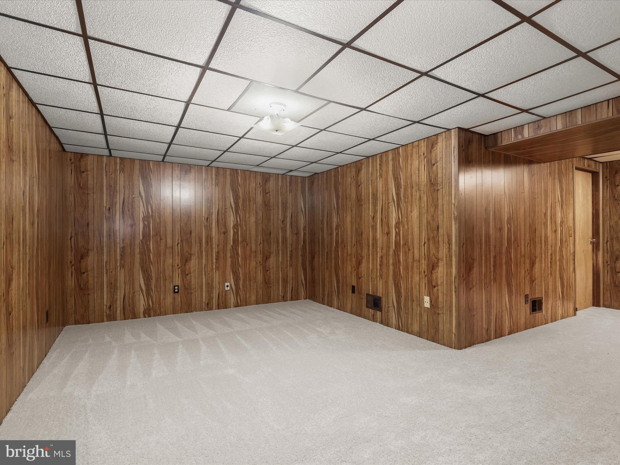 7971 Quail Court Glen Burnie, MD 21061 - Photo 39 of 52 a big room with wooden walls
