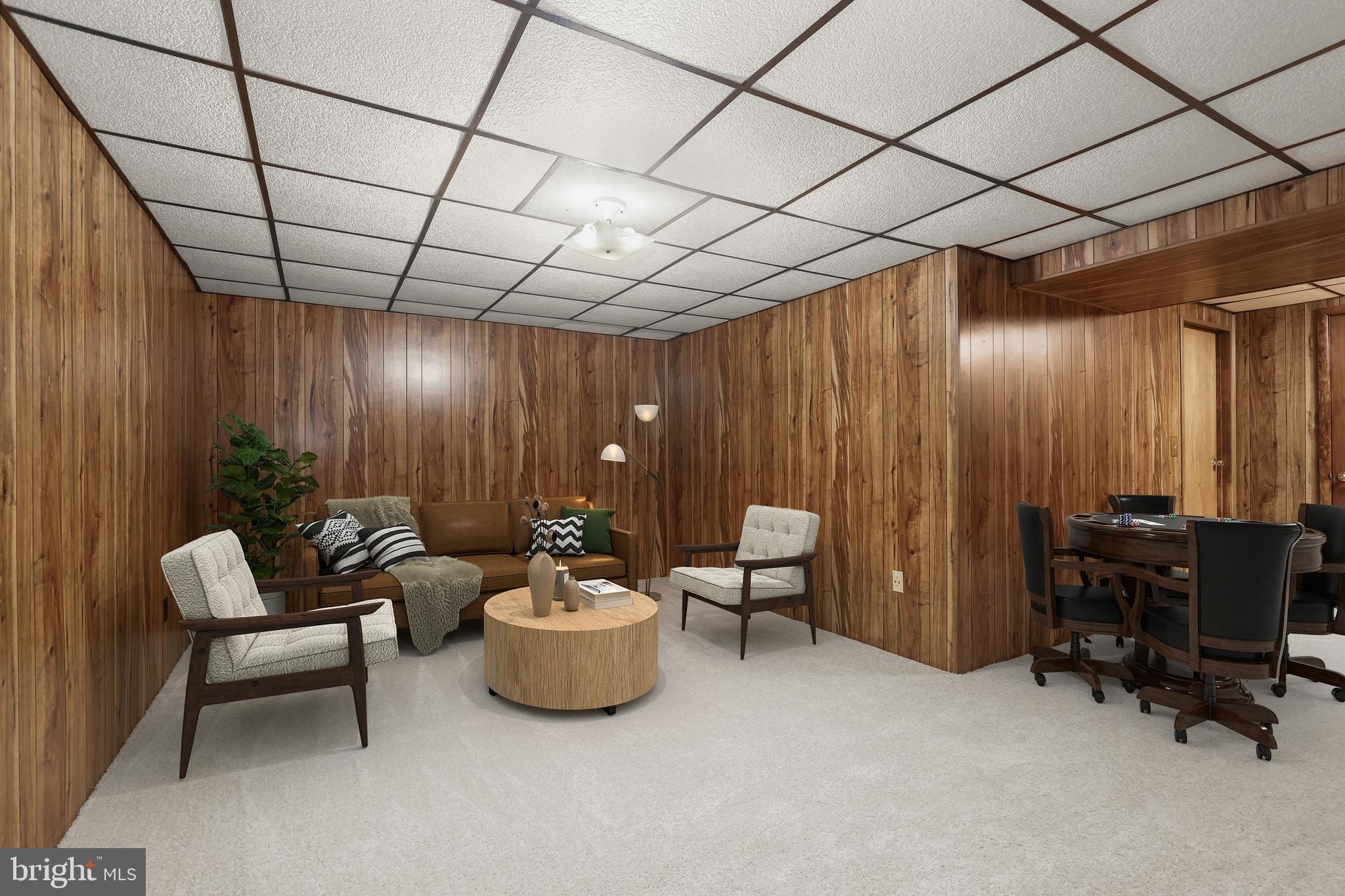 7971 Quail Court Glen Burnie, MD 21061 - Photo 7 of 52 a view of a livingroom with furniture and a projector