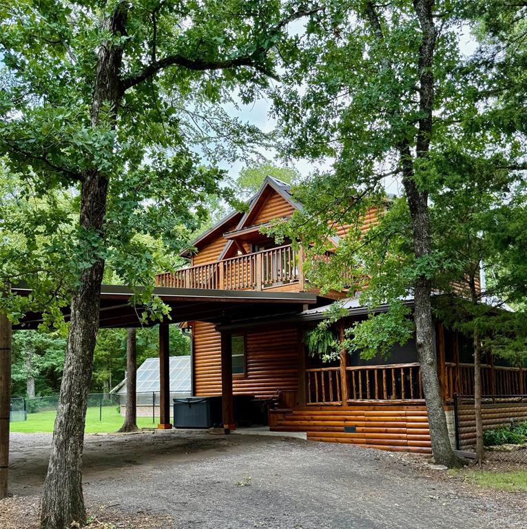 9819 Old Bridge Road Terrell, TX 75160 - Photo 1 of 1 Beautiful cabin in the woods!