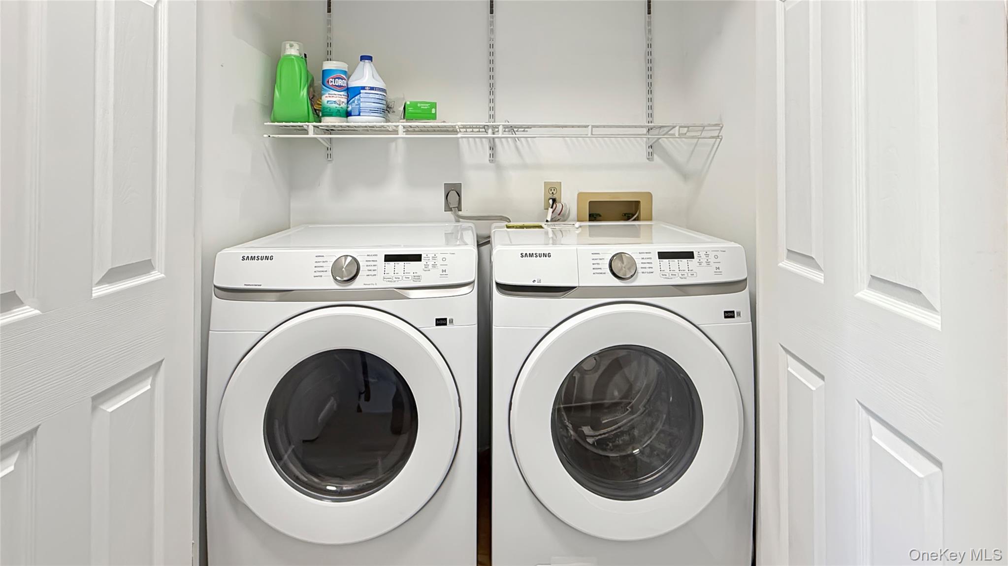 4 Forge Gate Drive, Unit F6B Cold Spring, NY 10516 - Photo 9 of 9 a utility room with dryer and washer