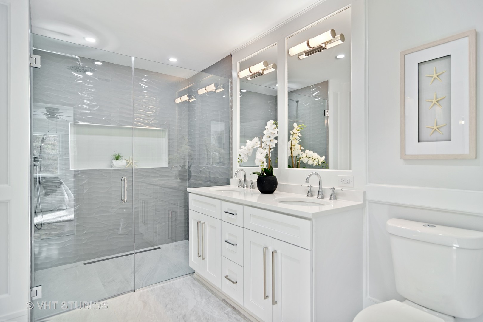 404 Cumnock Road Inverness, IL 60067 - Photo 16 of 34 a bathroom with a shower sink and mirror