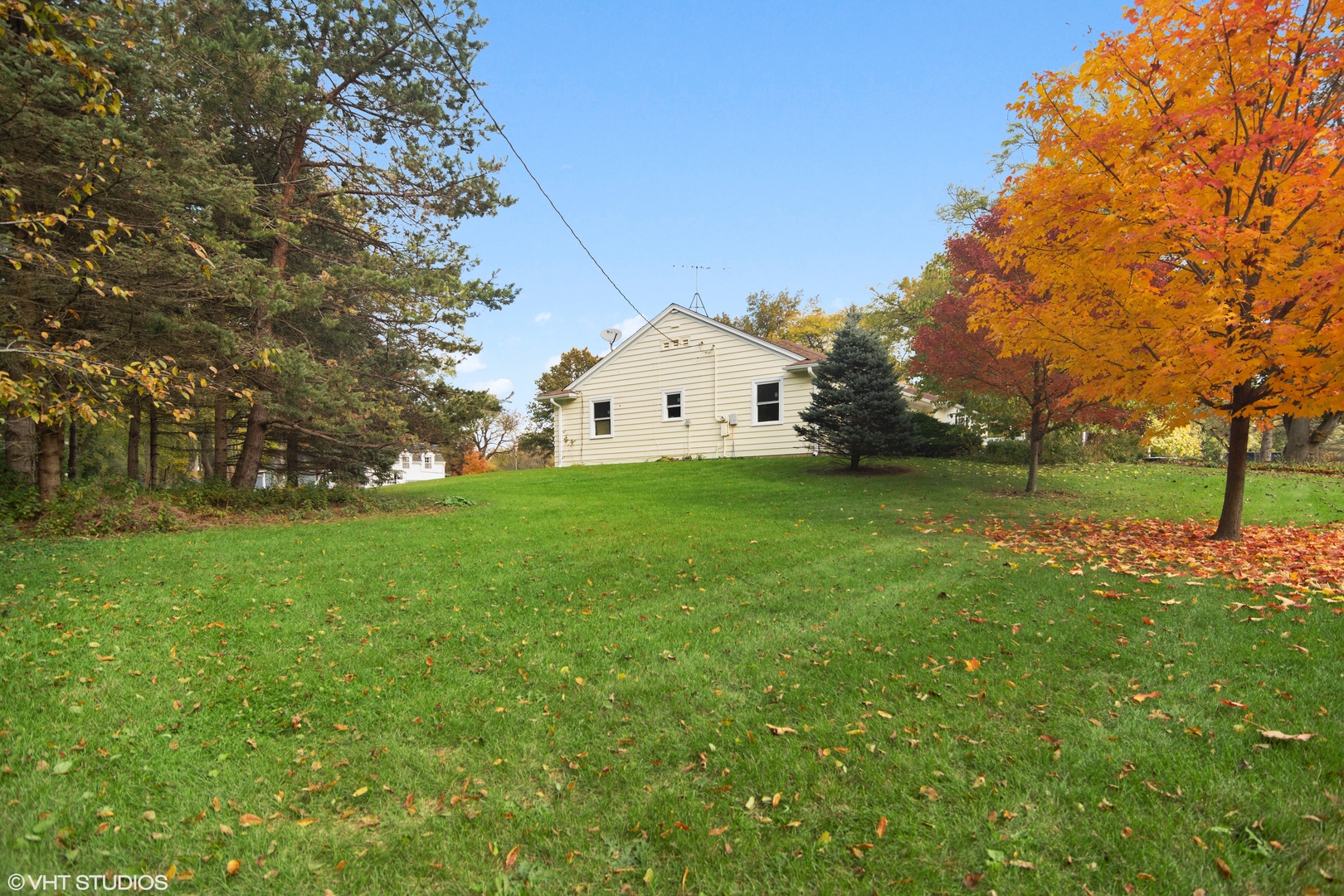 404 Cumnock Road Inverness, IL 60067 - Photo 28 of 34 a large building with a big yard and large trees