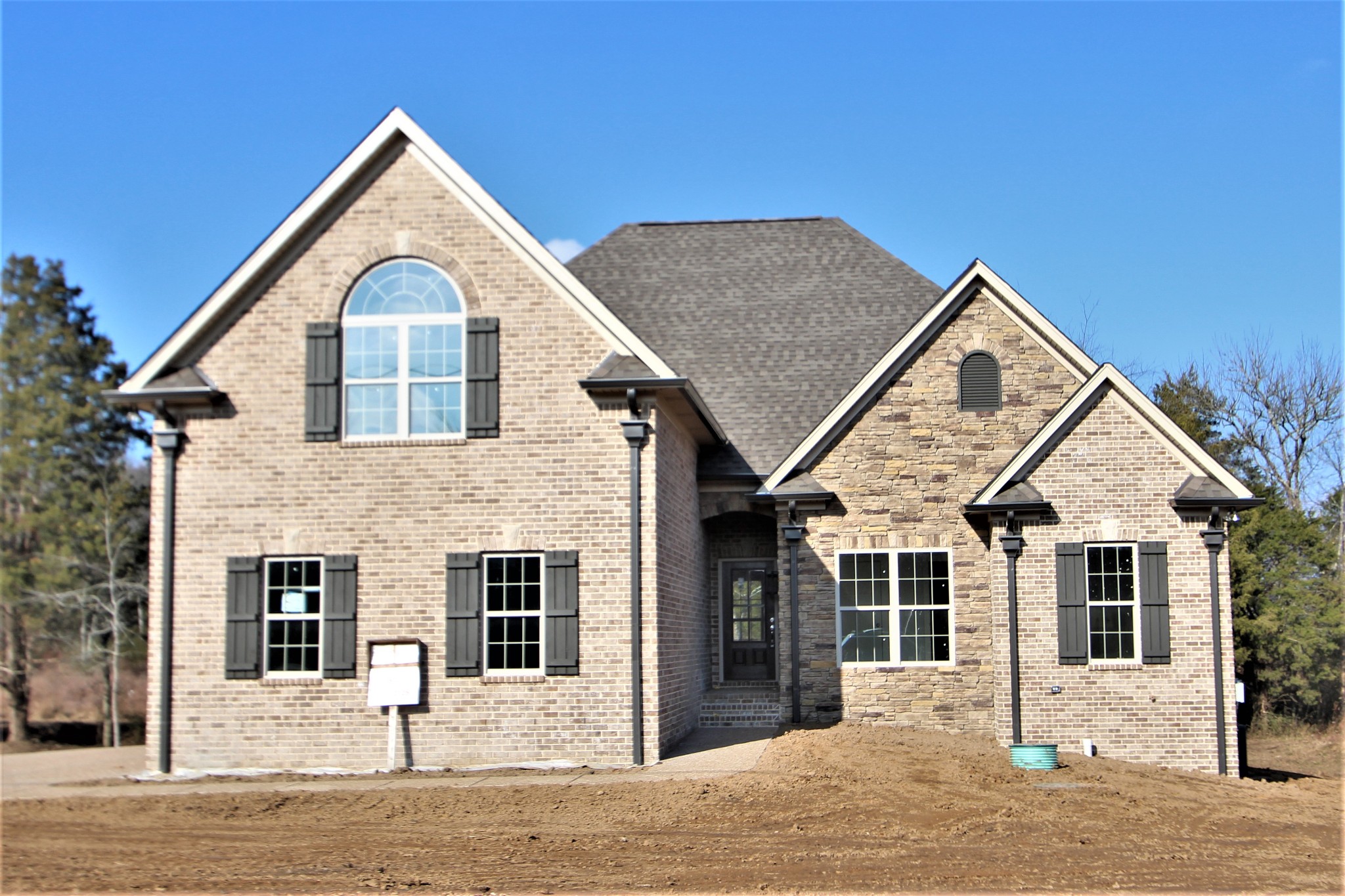 262 Ridgewater Way, Unit 83 Mount Juliet, TN 37122 - Photo 1 of 21 a front view of a house with a yard