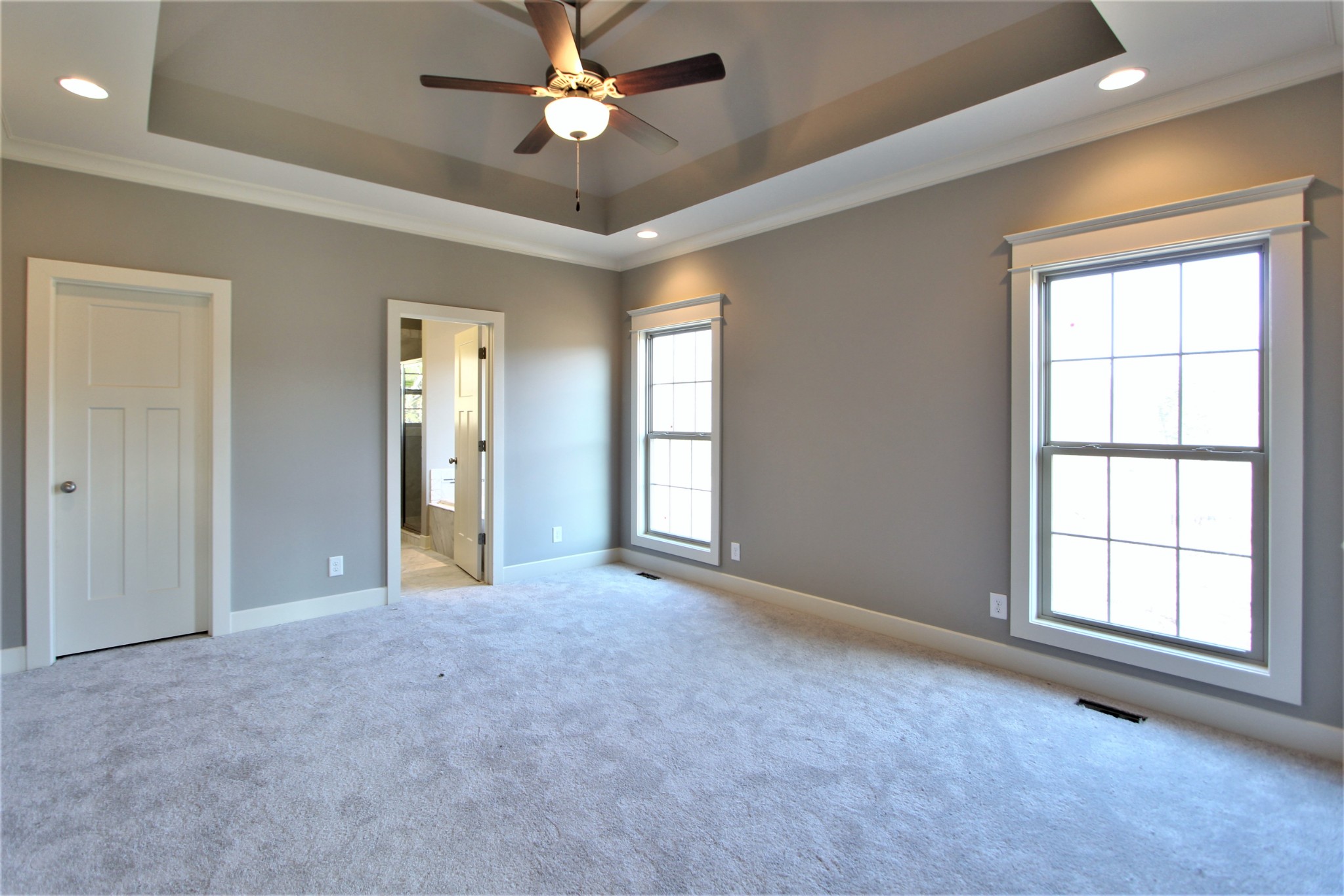 262 Ridgewater Way, Unit 83 Mount Juliet, TN 37122 - Photo 11 of 21 an empty room with windows and ceiling fan