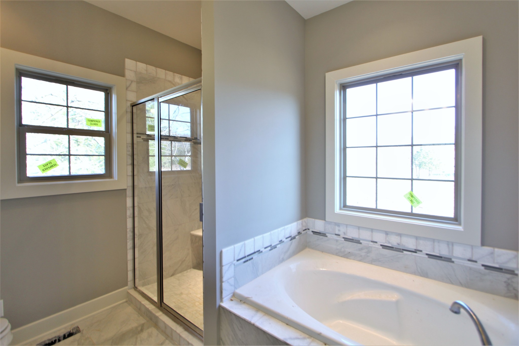 262 Ridgewater Way, Unit 83 Mount Juliet, TN 37122 - Photo 17 of 21 a bathroom with a tub and a sink