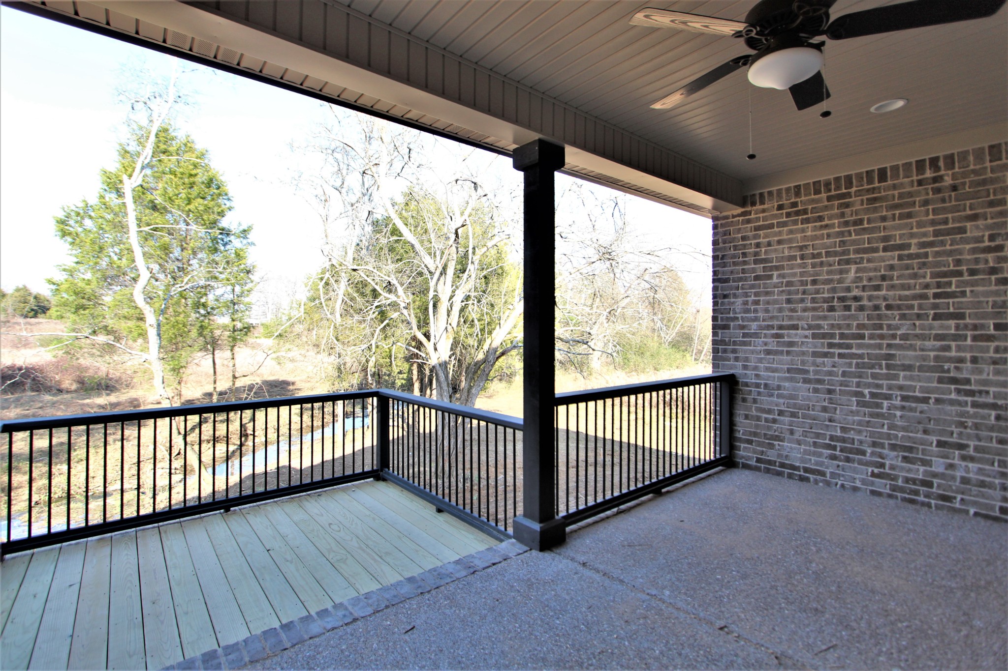 262 Ridgewater Way, Unit 83 Mount Juliet, TN 37122 - Photo 20 of 21 a view of a porch with wooden floor