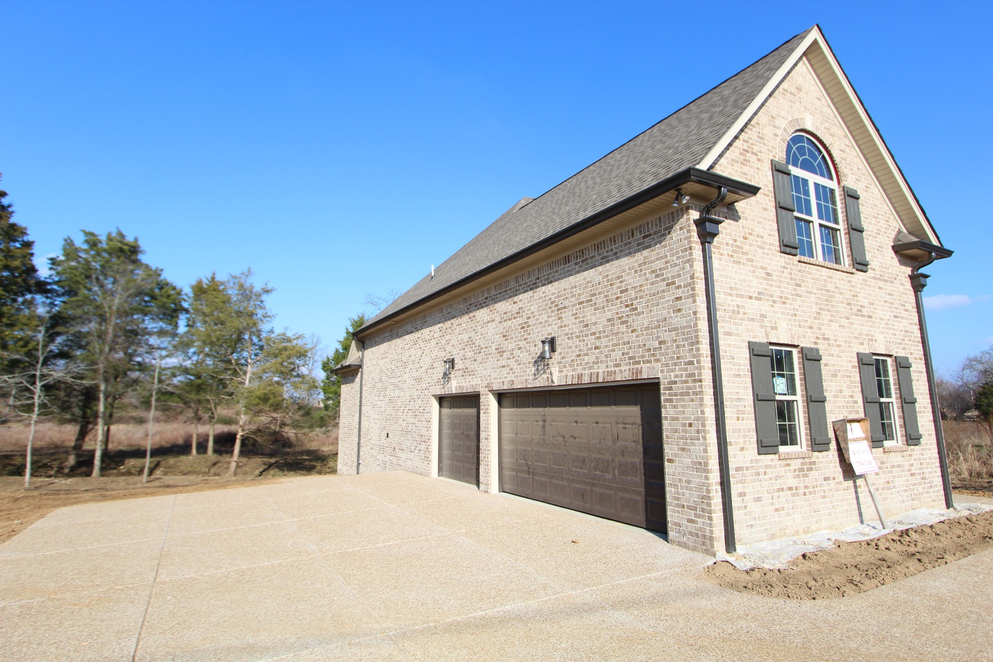 262 Ridgewater Way, Unit 83 Mount Juliet, TN 37122 - Photo 21 of 21 a view of a white house with a yard