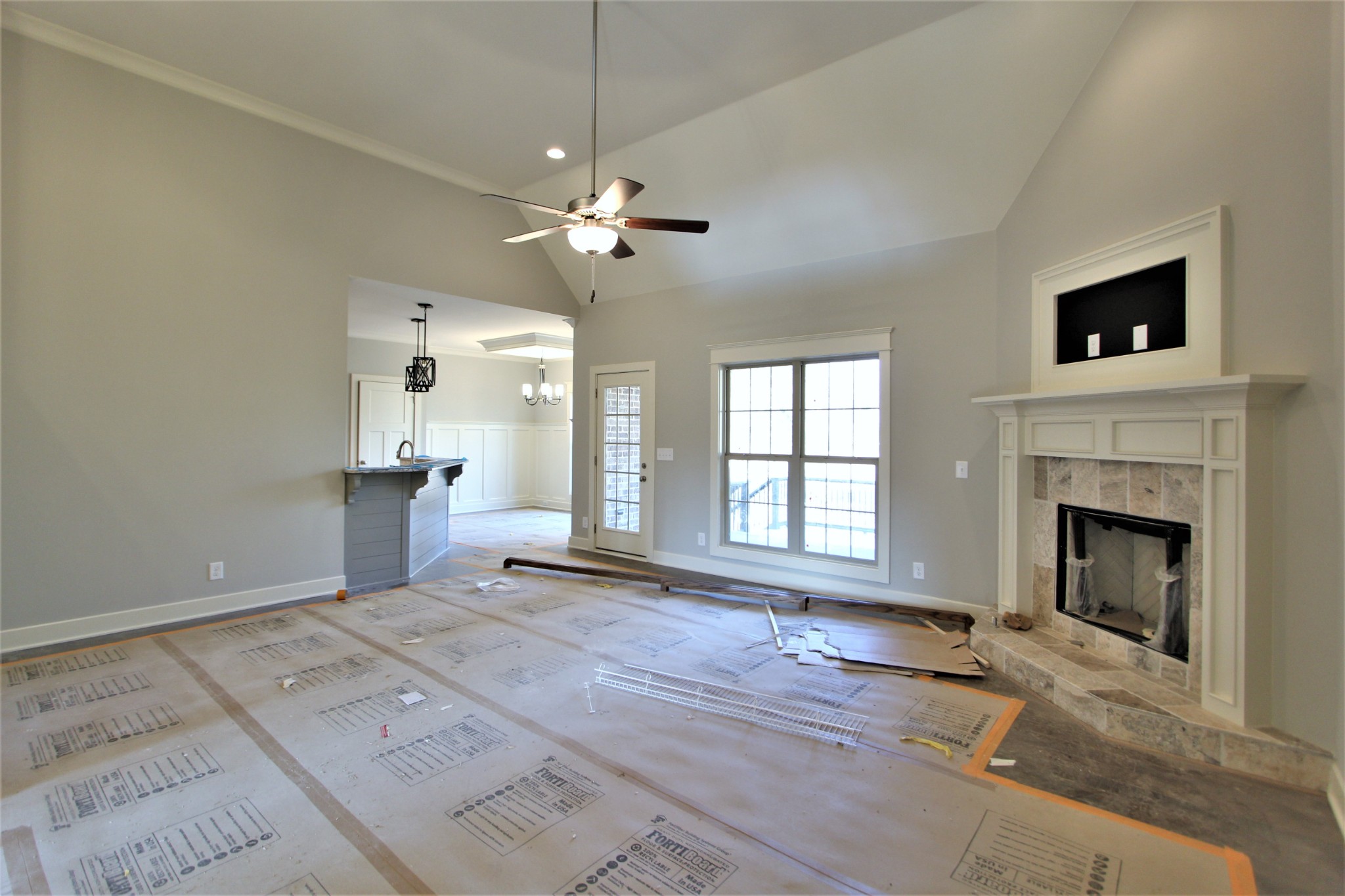 262 Ridgewater Way, Unit 83 Mount Juliet, TN 37122 - Photo 4 of 21 a view of an empty room with a fireplace and a window