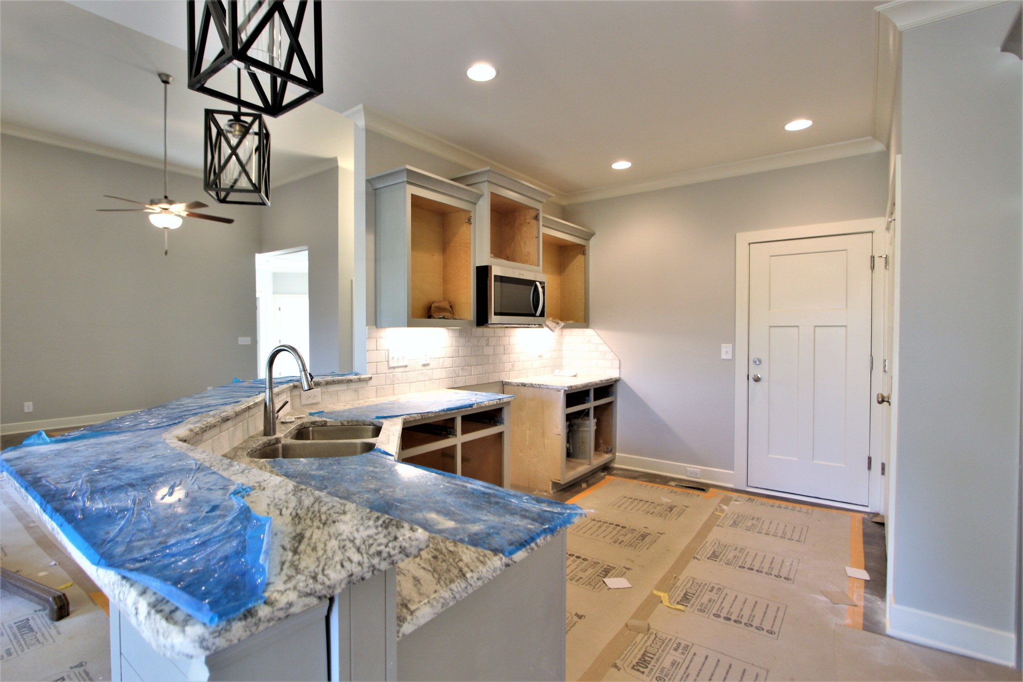 262 Ridgewater Way, Unit 83 Mount Juliet, TN 37122 - Photo 7 of 21 a kitchen with stainless steel appliances granite countertop a sink and a stove