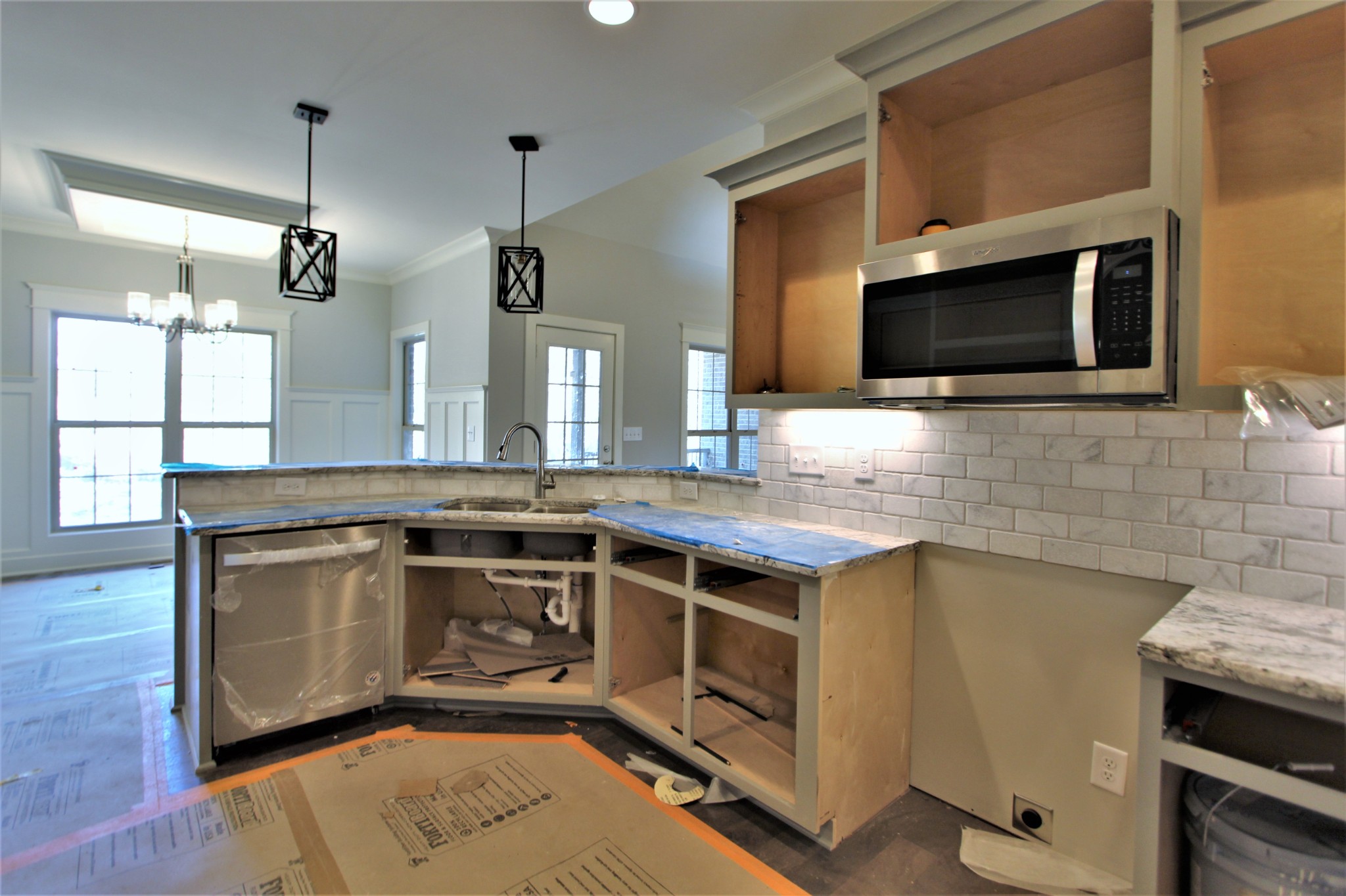 262 Ridgewater Way, Unit 83 Mount Juliet, TN 37122 - Photo 9 of 21 a kitchen with a stove and a microwave