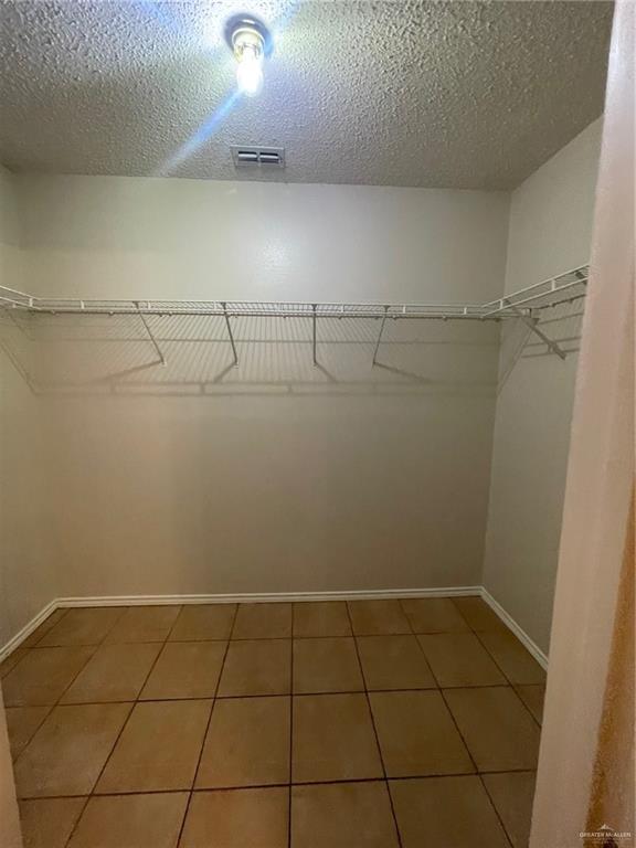 312 Roundup Circle Edinburg, TX 78539 - Photo 11 of 21 a view of a room with racks on the wall