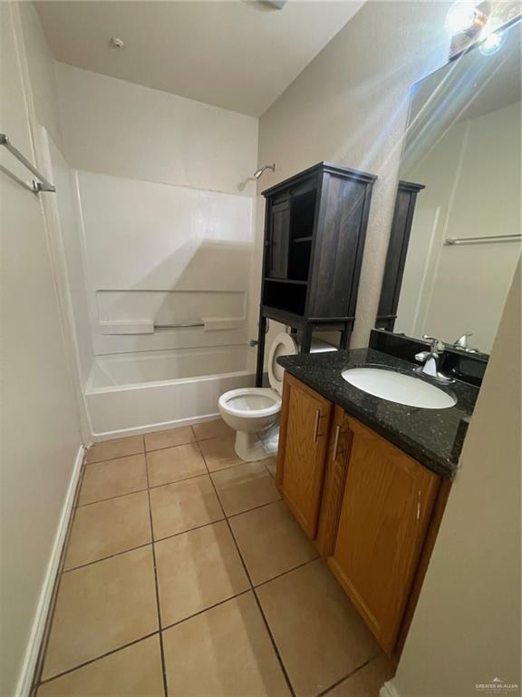 312 Roundup Circle Edinburg, TX 78539 - Photo 14 of 21 a bathroom with a sink a toilet and shower
